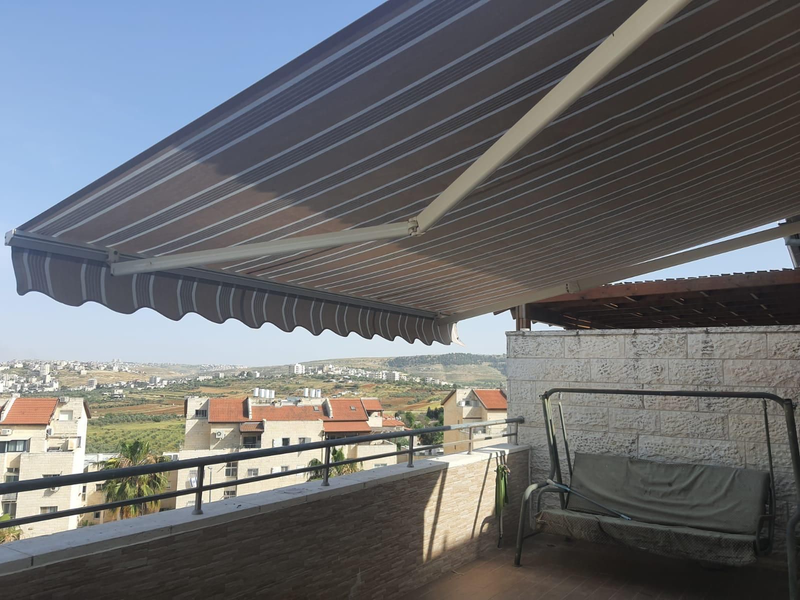 סוכך זרועות חשמלי