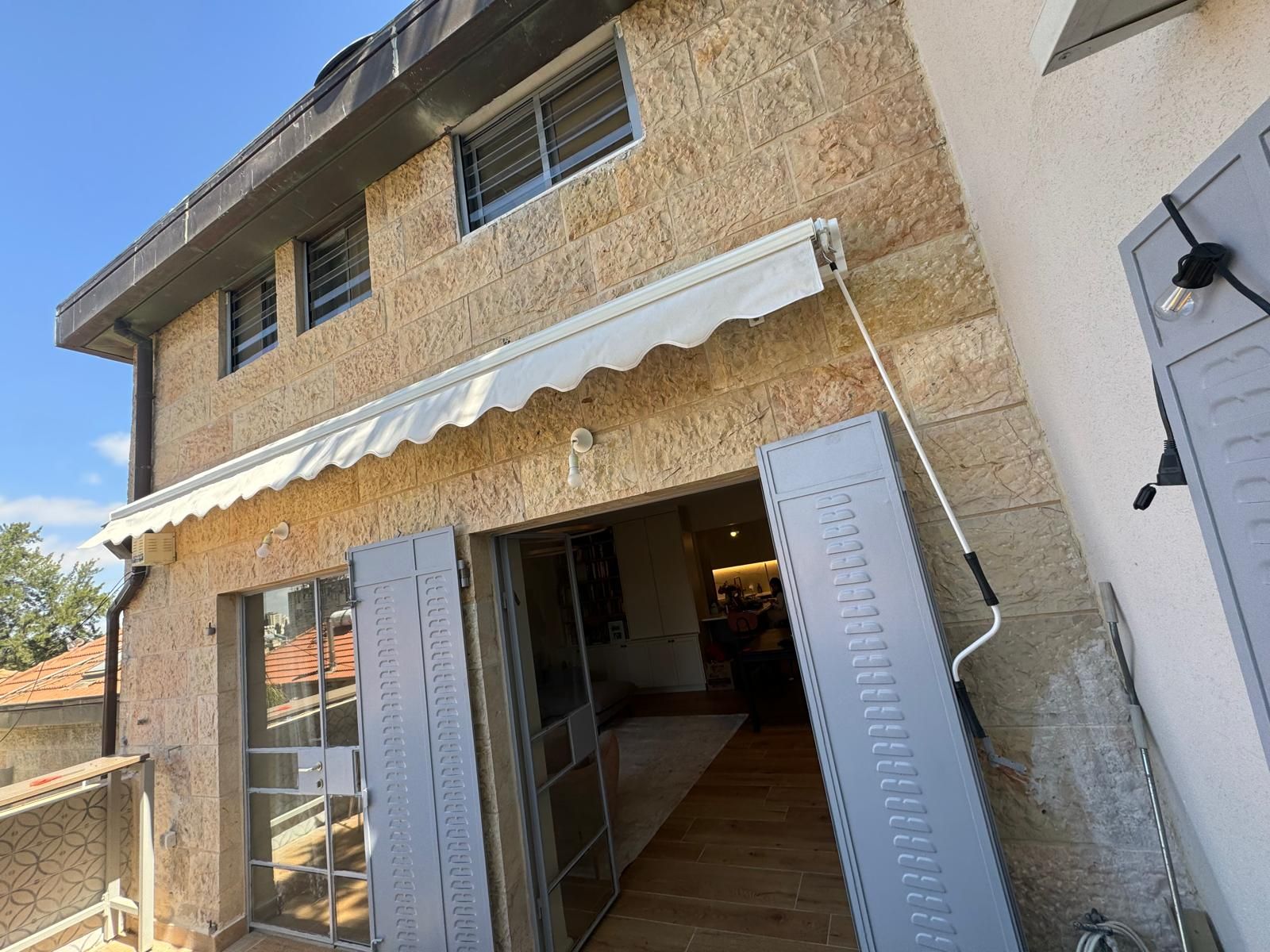 סוכך זרועות חשמלי