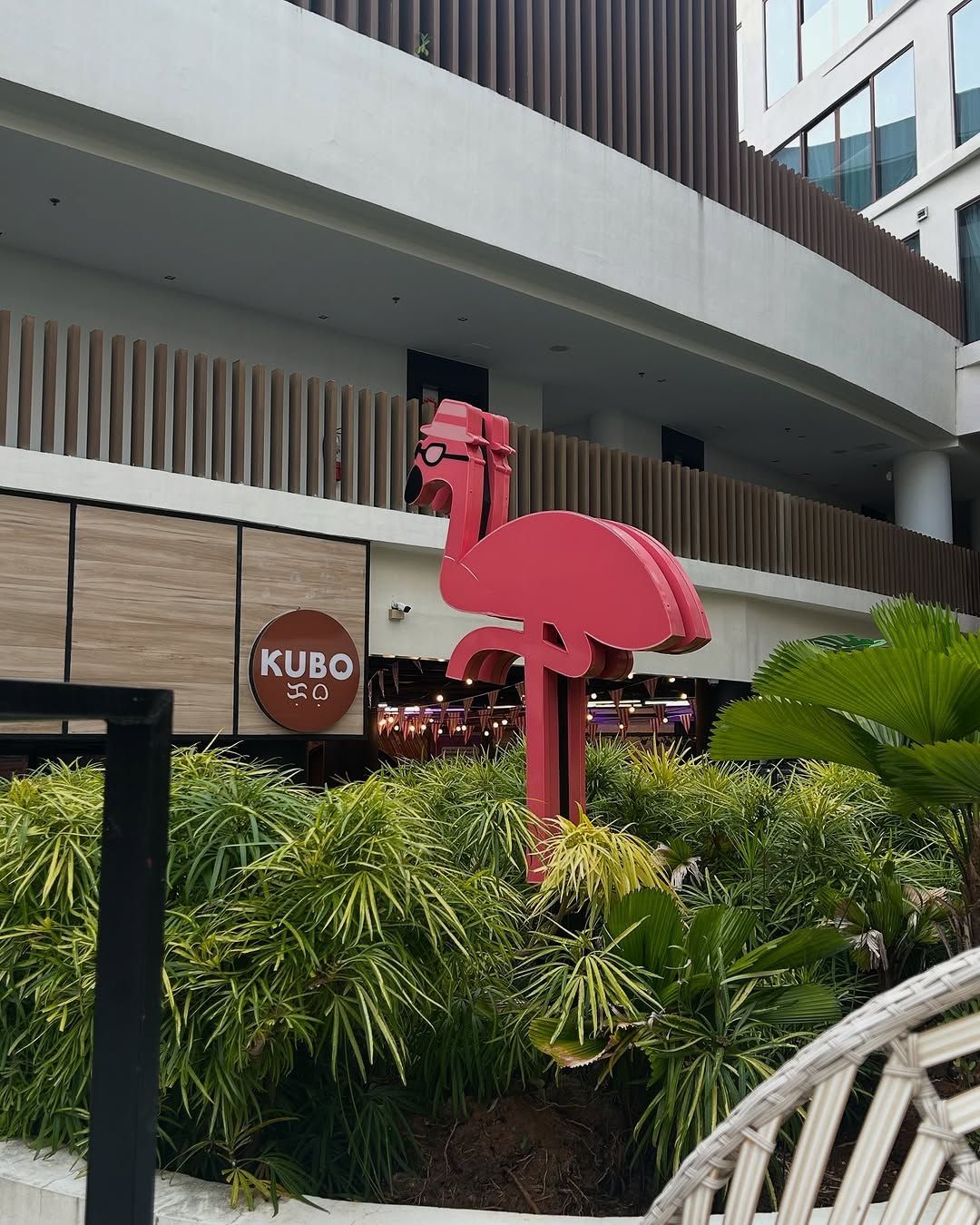 A flamingo statue is in Hue Hotels Boracay