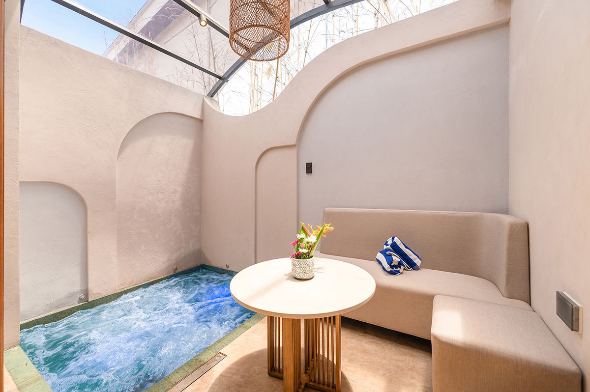 Hue Siargao private plunge pool with lounge seating and skylight