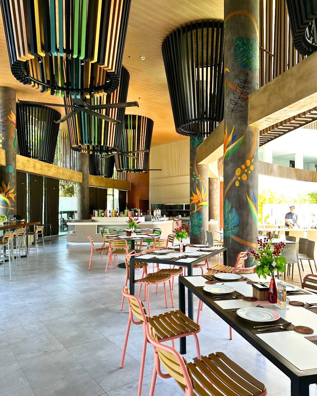 A restaurant with tables and chairs at Hue Hotel Boracay 