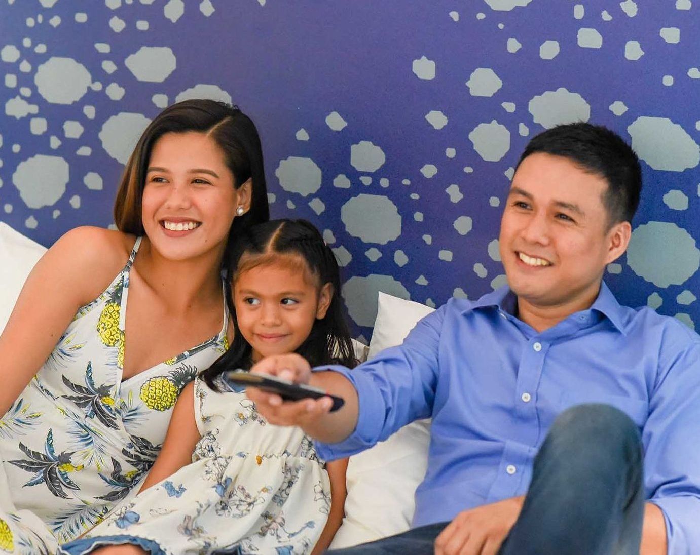 Happy family relaxing at Hue Hotel Boracay, showcasing family-friendly accommodations