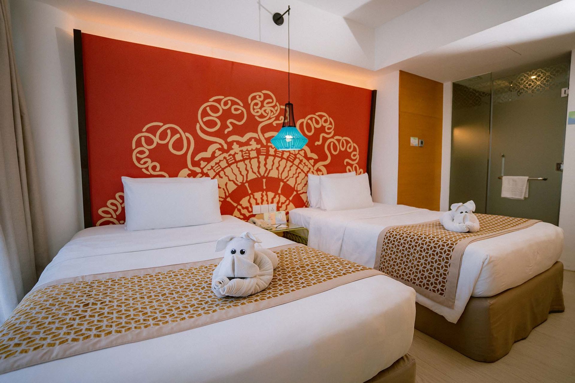 Vibrant orange-accent room Boracay station 2