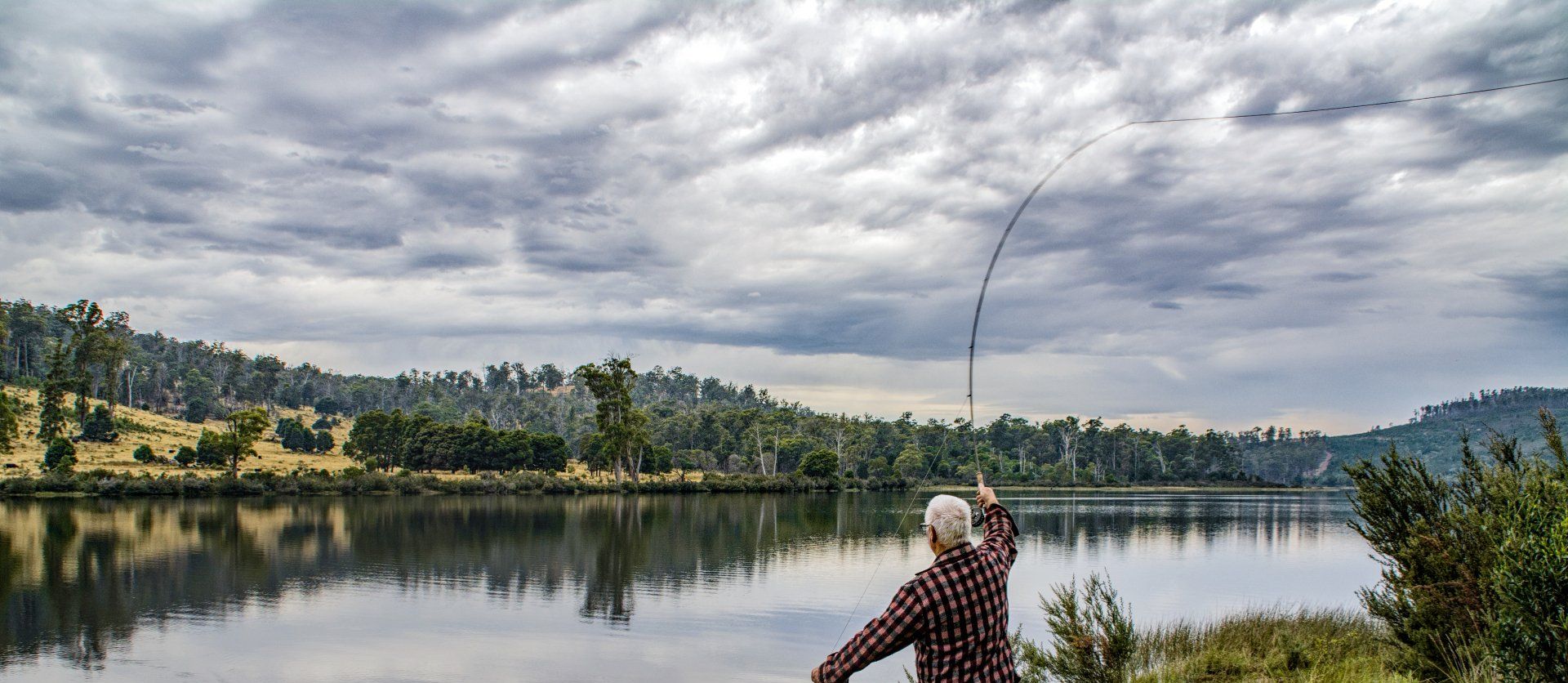 man-fishing-on-the-montana-river