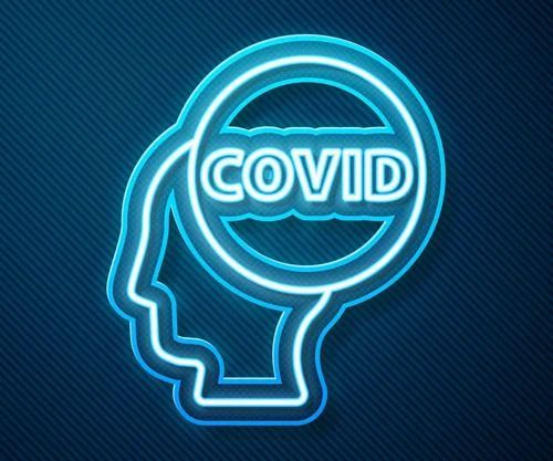 A neon sign of a person 's head with the word covid inside of it.