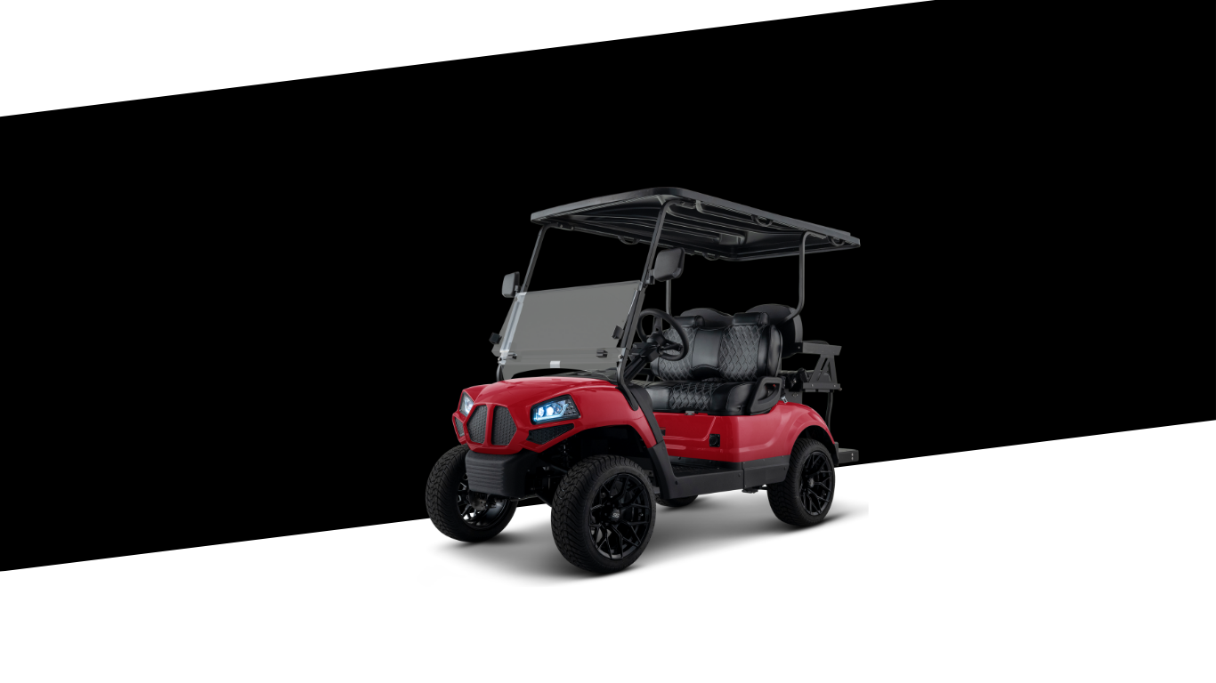 Red golf cart with black accents and a windshield against a black and white background.