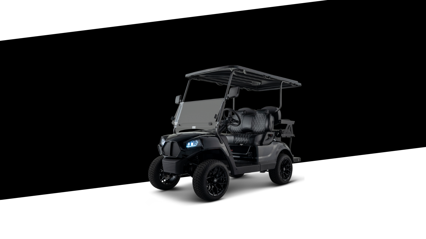 Black golf cart with off-road tires, parked on a black and white background.