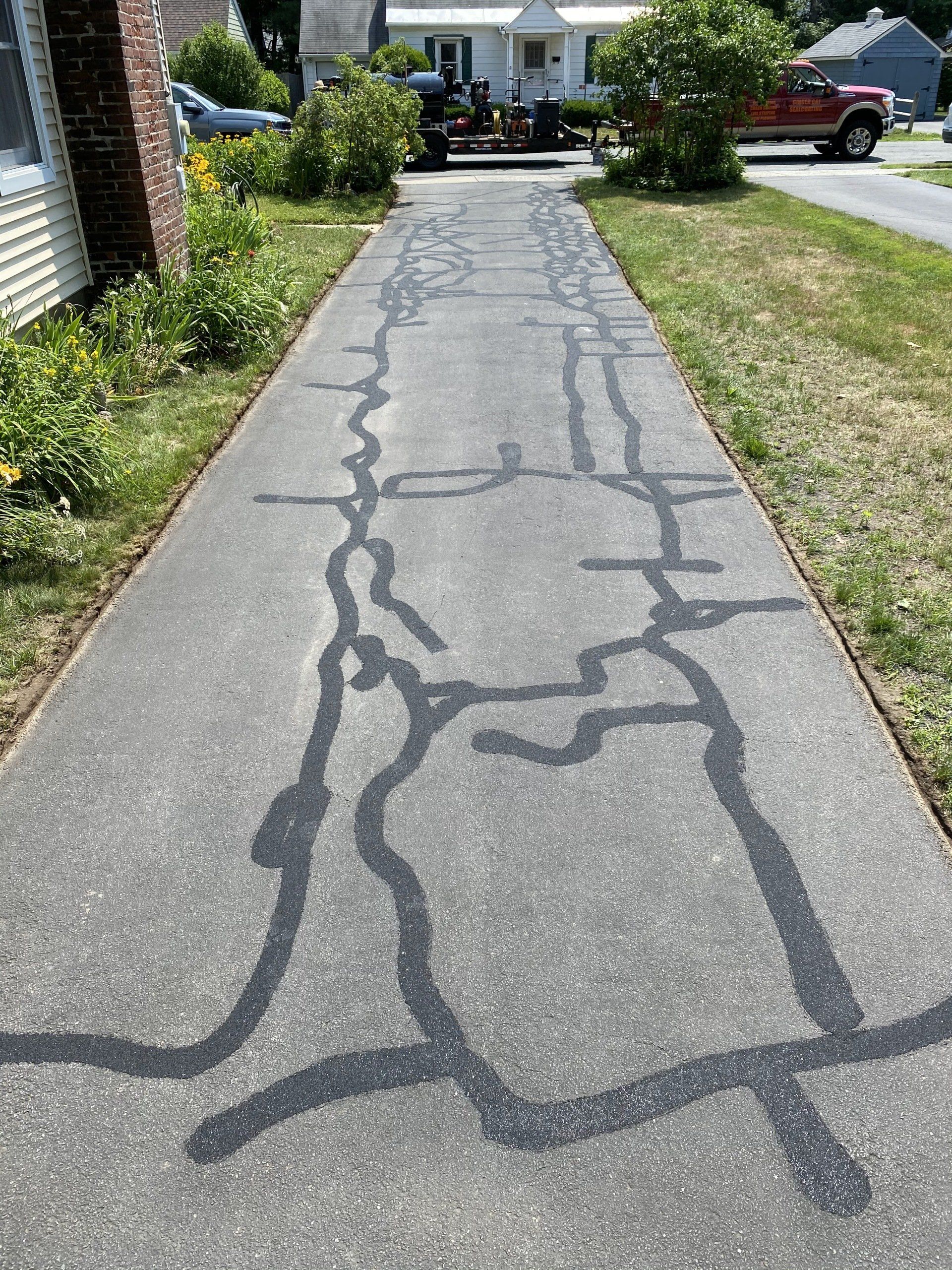 Crack Sealing Central & West MA Ginger Cat Sealcoating