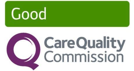 The logo for the good care quality commission is green and purple.