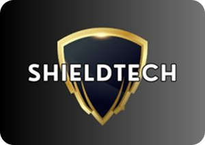 ShieldTech logo with a golden-edged shield over a black background, the text "SHIELDTECH" is white and horizontal.