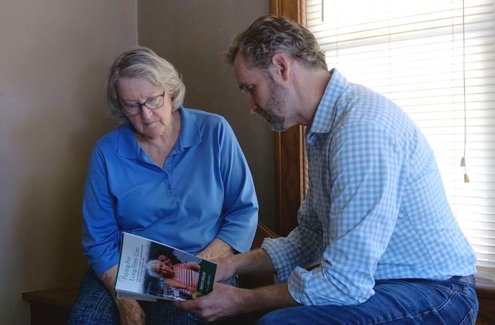 Family Shepherd Founder Ben Rao is working with a senior in her home.