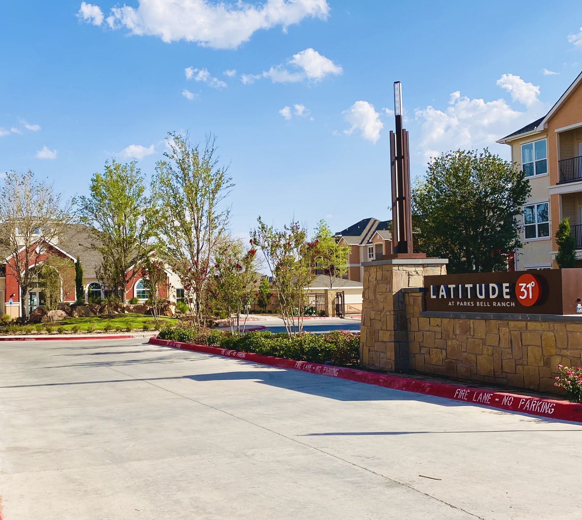 A sign for latitude 31 is on the side of the road