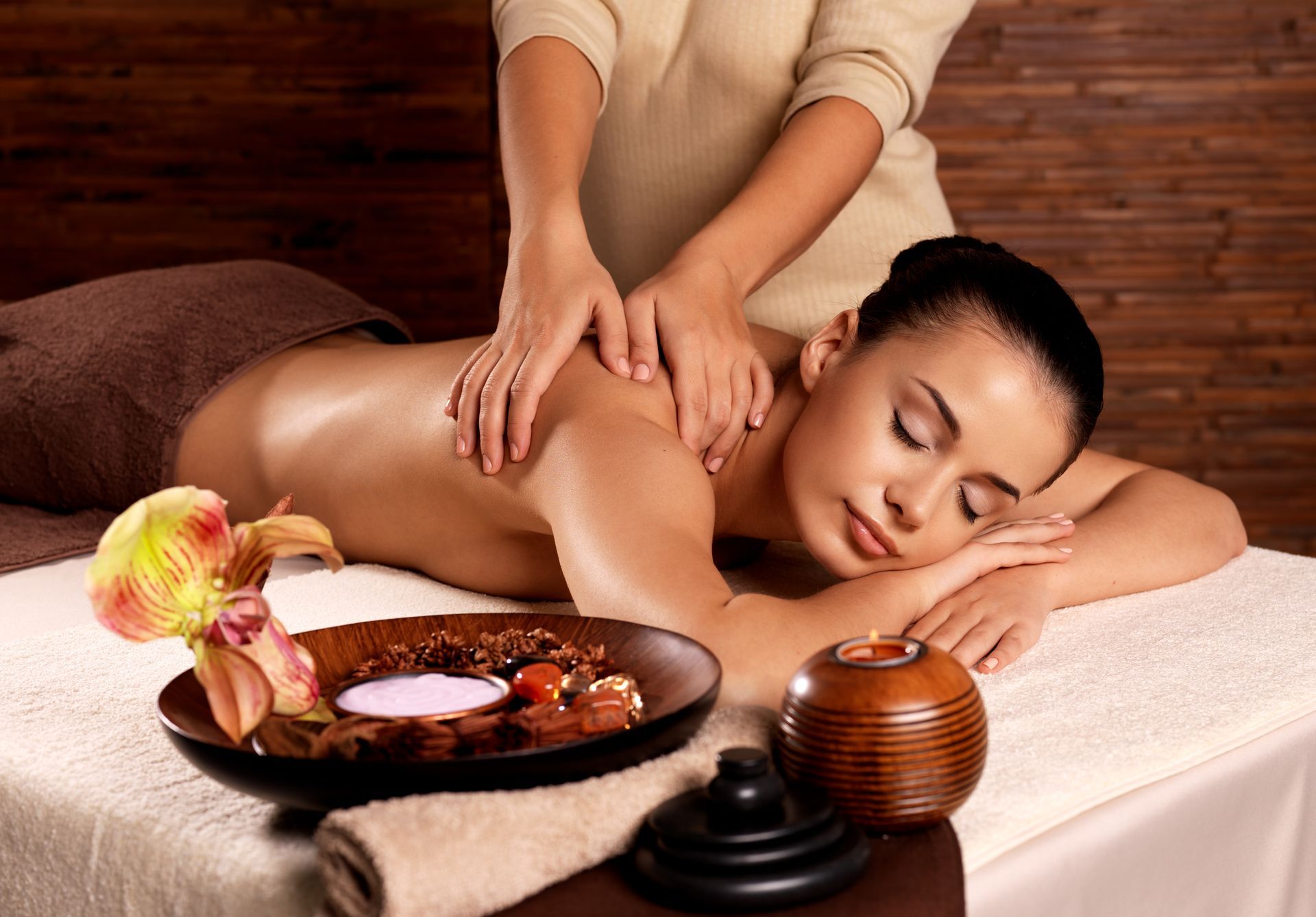 A woman is getting a massage at a spa.