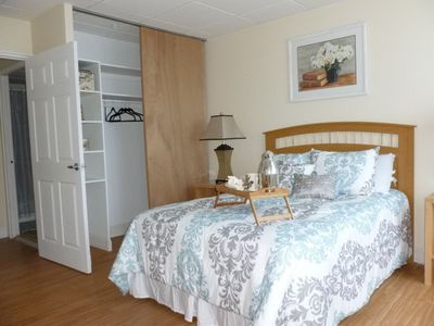 A bedroom with a bed and a tray on it