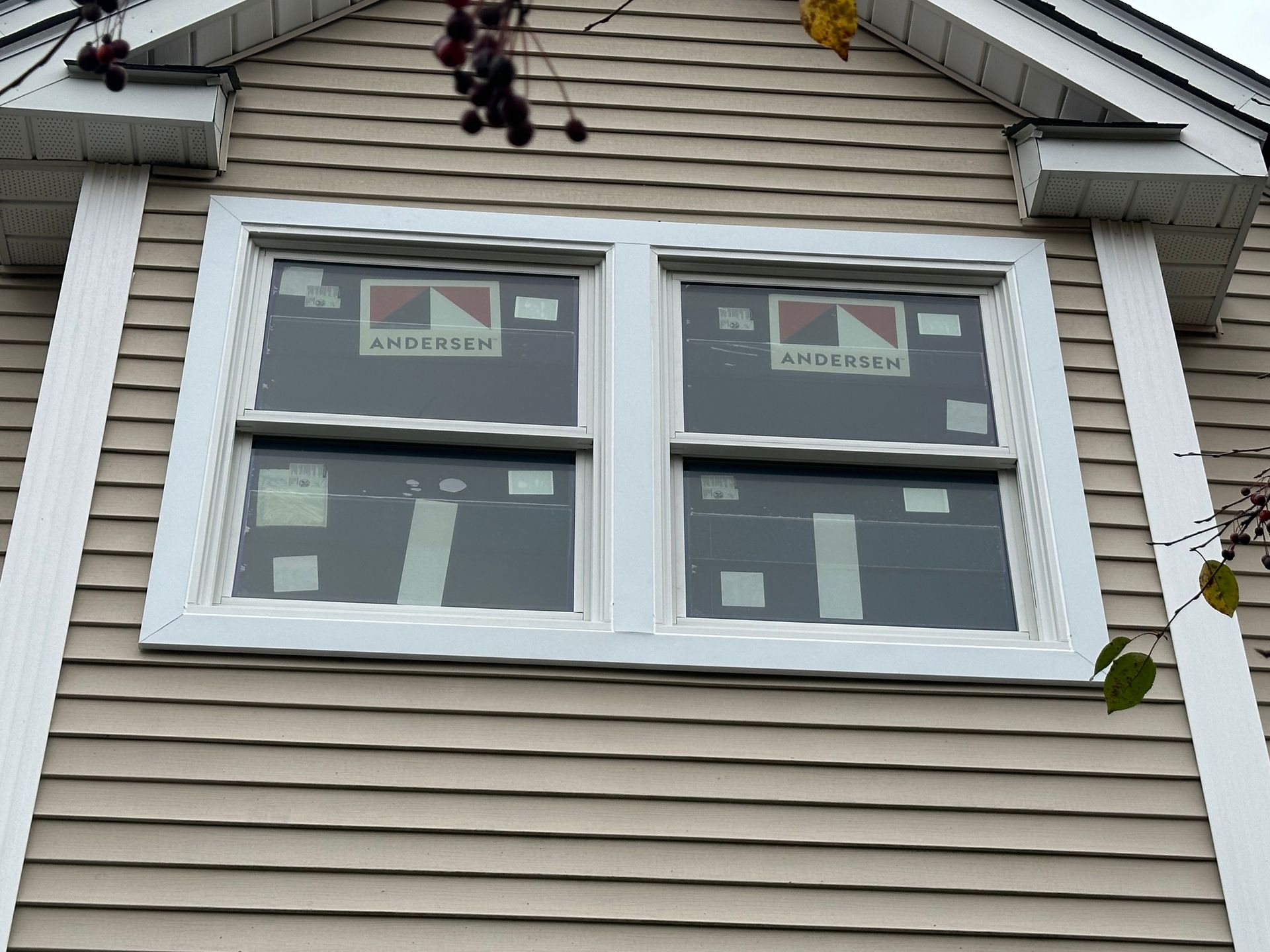 A house with a window that is being installed