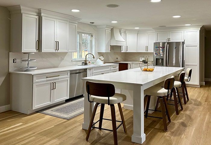 A newly Refaced Kitchen, classic white shaker style door, and custom island