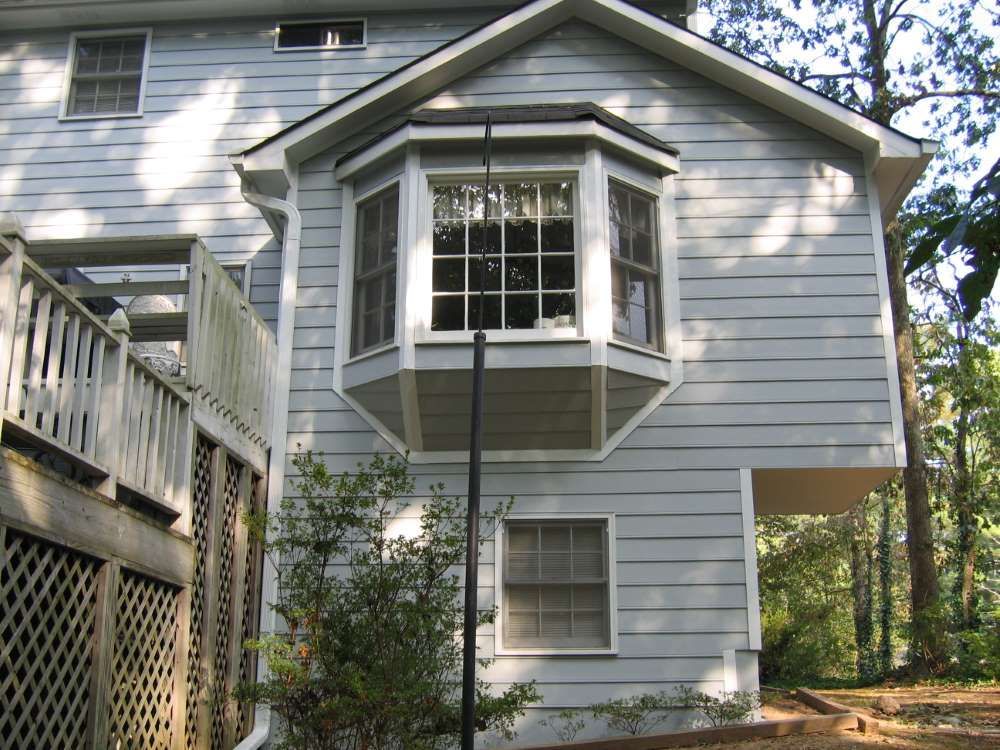 The back of a house with a bay window