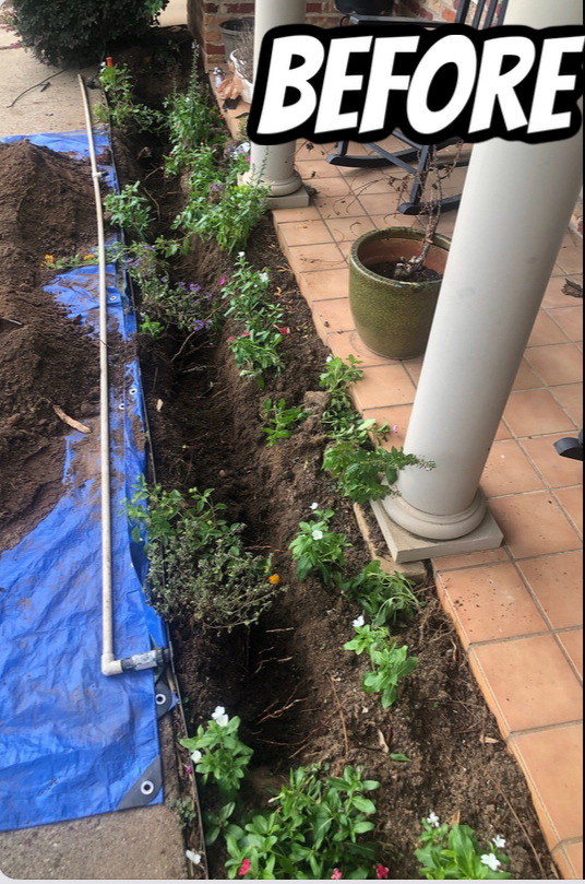 A garden bed with young plants lining a trench next to a porch column; 