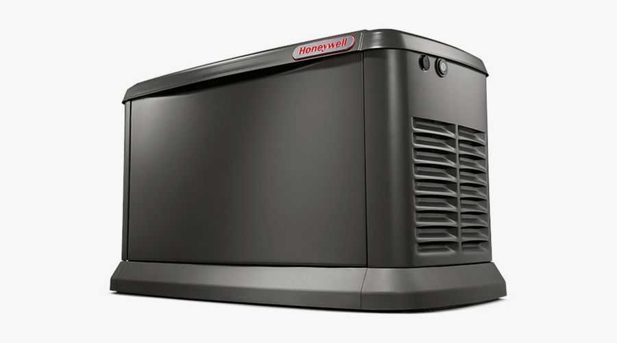A black generator is sitting on top of a white surface.