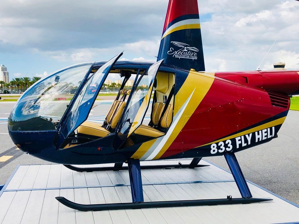 A Red Yellow and Blue Helicopter — St. Petersburg, FL — Executive Helicopter Tours