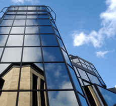 A tall glass commercial building