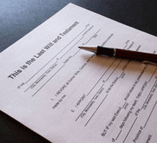 A black pen on a Last Will and Testament document