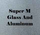 Super M Glass And Aluminum text on a textured, gray background.