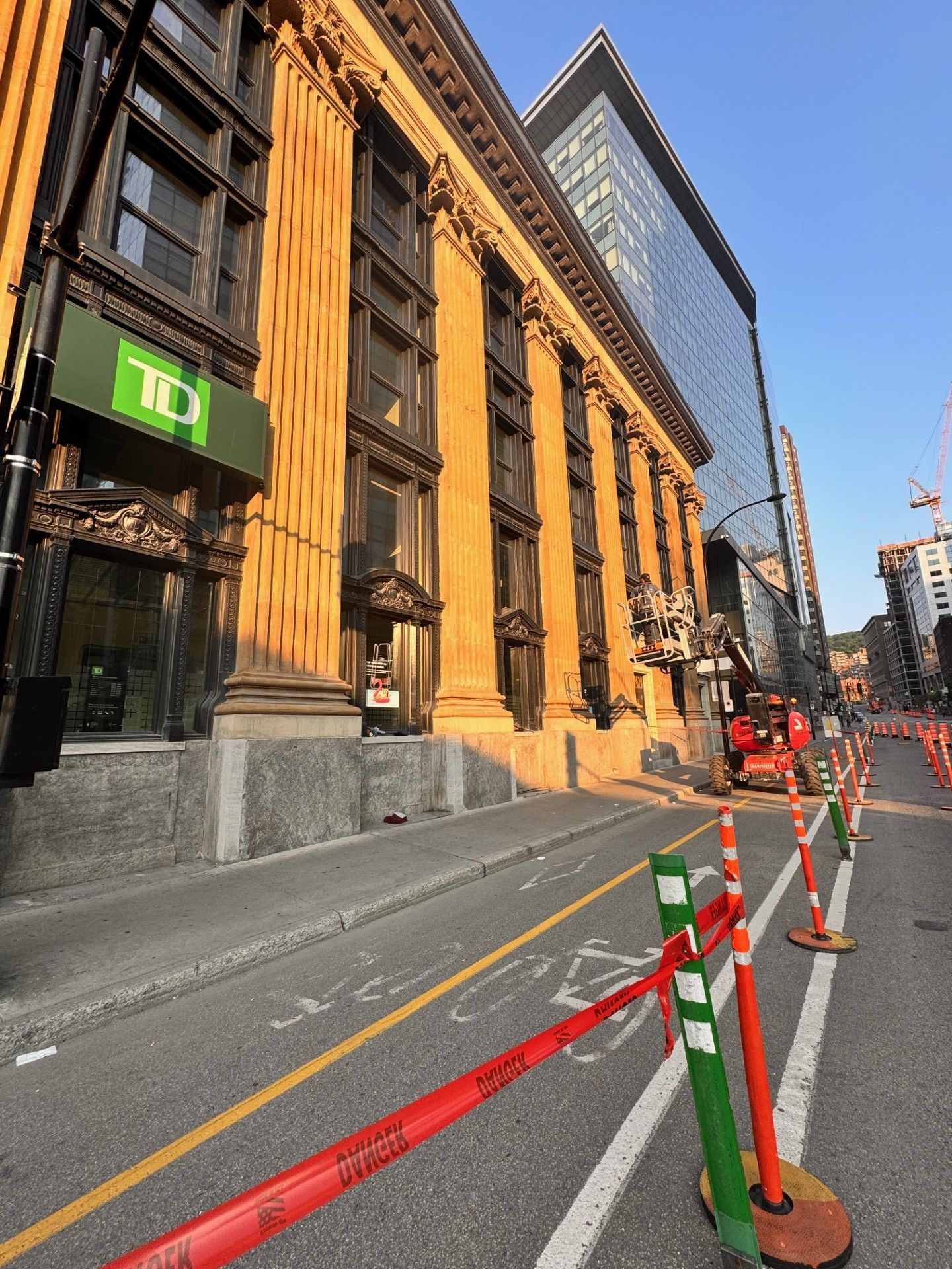 A large building with a green sign that says td on it