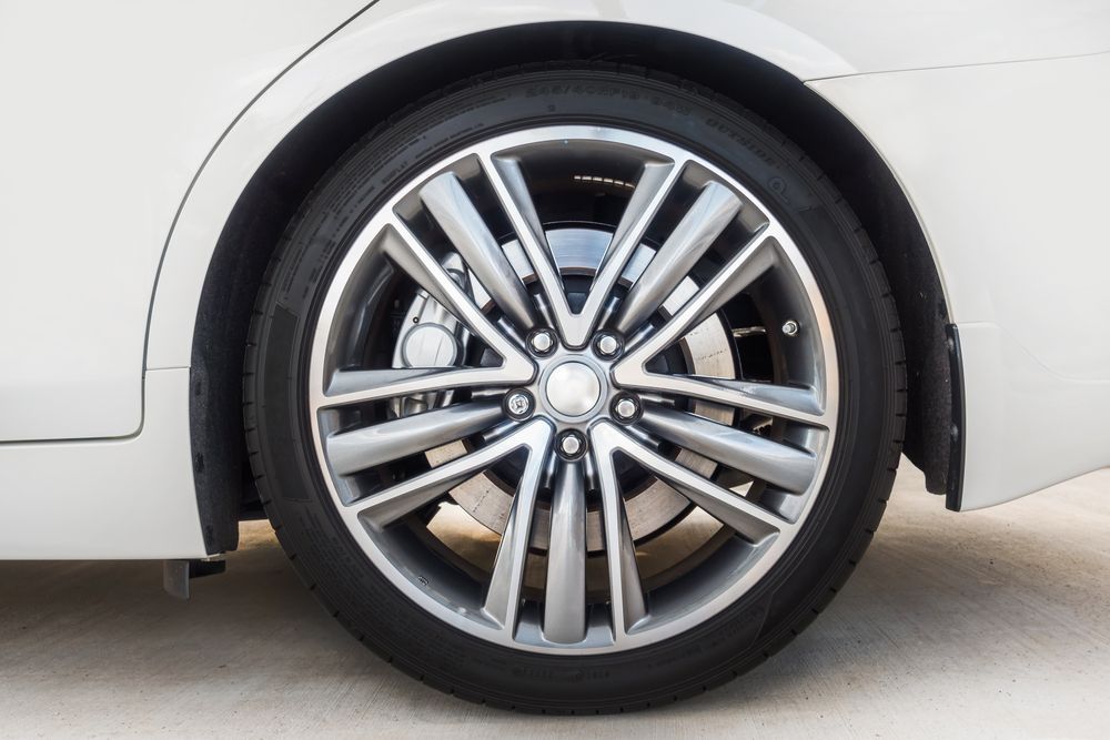 Close-up of a White Car's Alloy Wheel With Dark Tire — Ben's Tyres in Gulgong, NSW