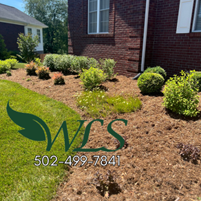 A lawn with a wls logo on it