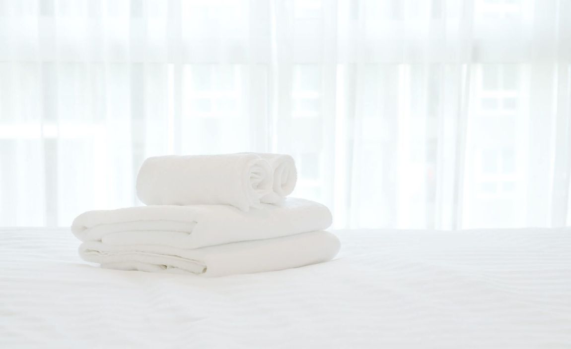 asciugamani su un letto