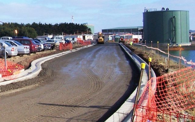 A Construction Site With A Lot Of Cars Parked On The Side Of The Road – Warrnambool, VIC - McKinnon Quarries & Civil