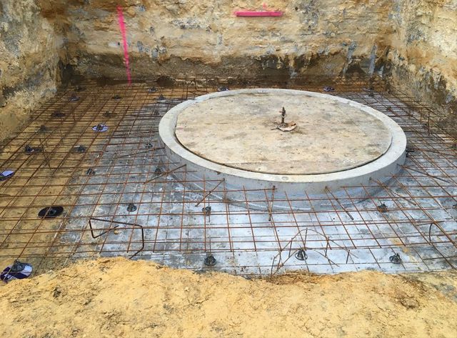 A Manhole Cover Is Sitting In The Middle Of A Hole In The Ground – Warrnambool, VIC - McKinnon Quarries & Civil