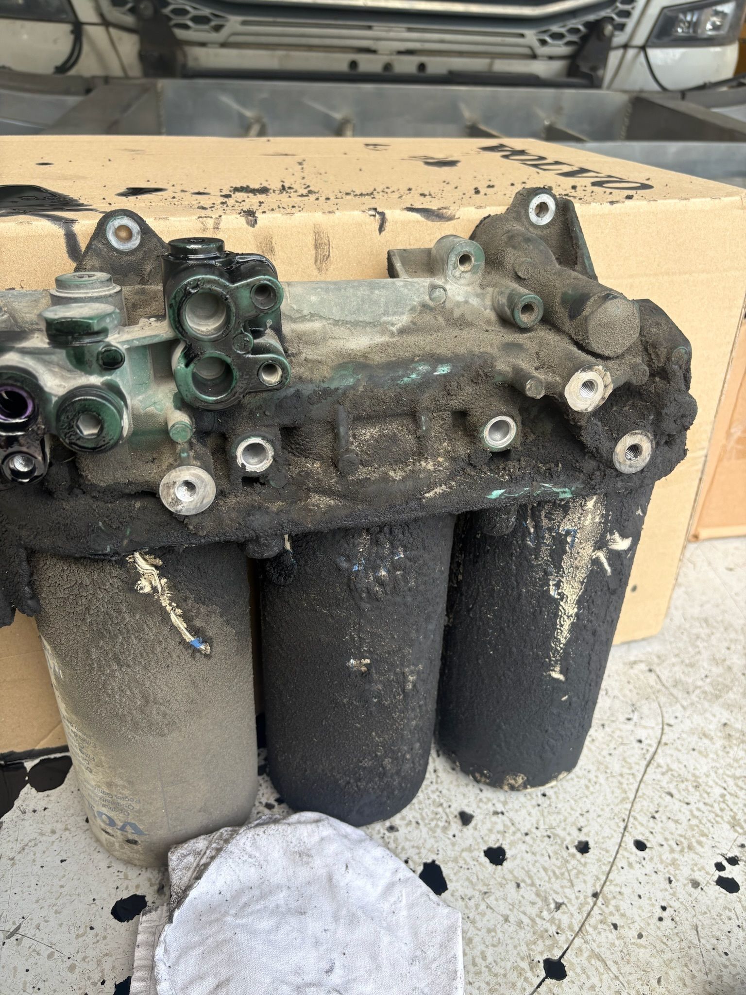 Dirty automotive filter assembly covered in black residue — Prime Mobile Mechanics in Varsity Lakes, QLD