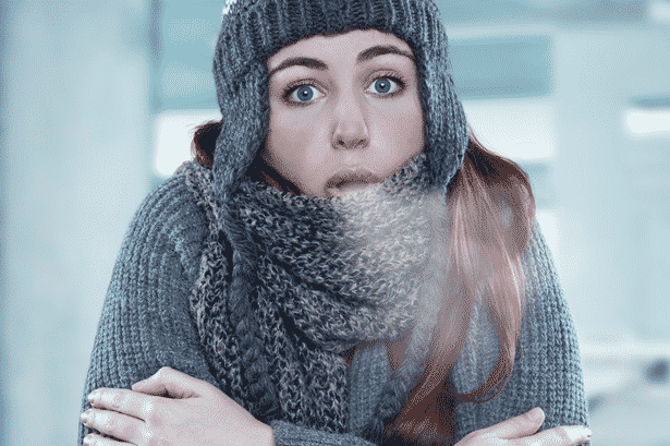Woman bundled in winter clothing