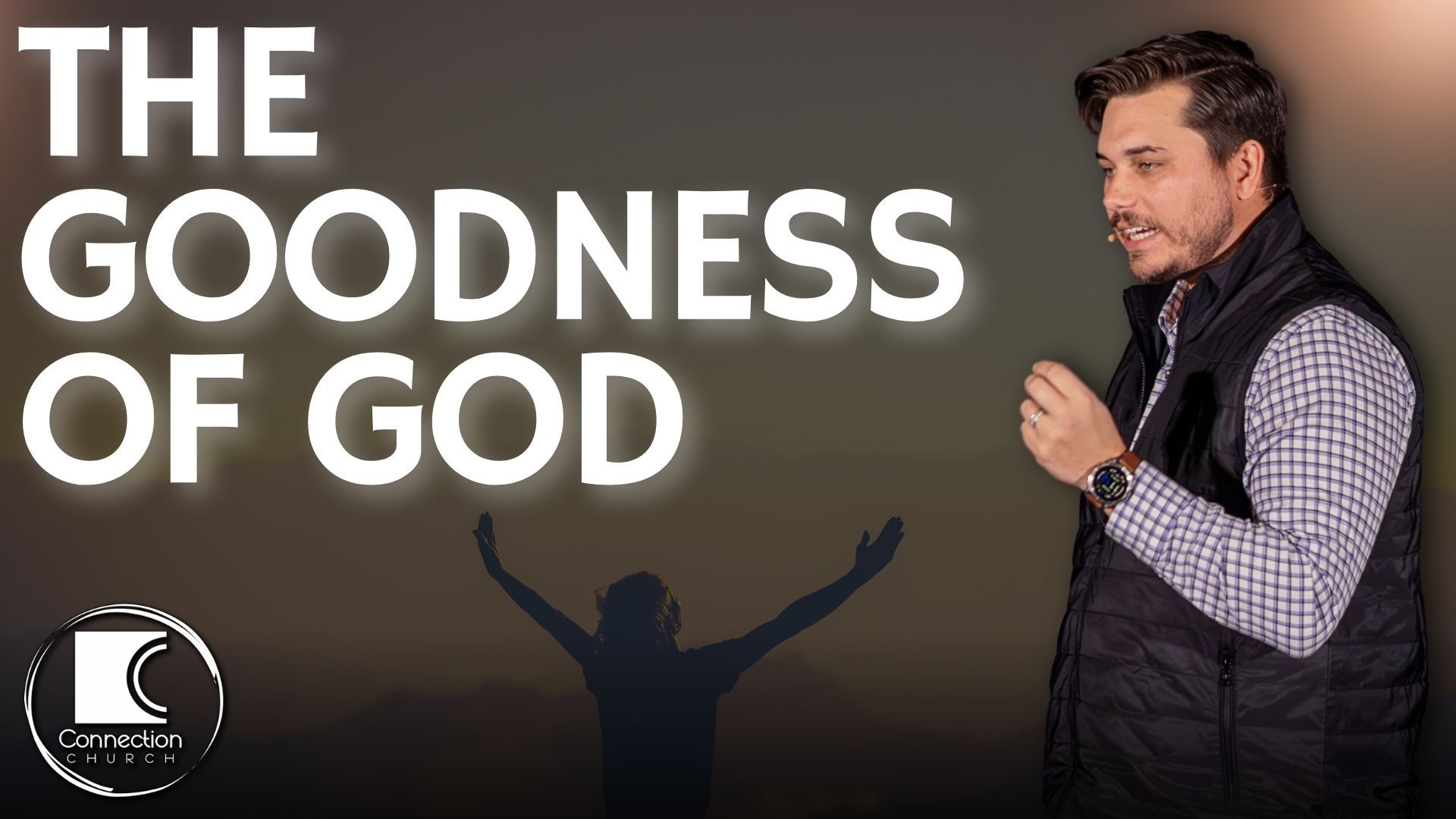 Man speaking next to title 