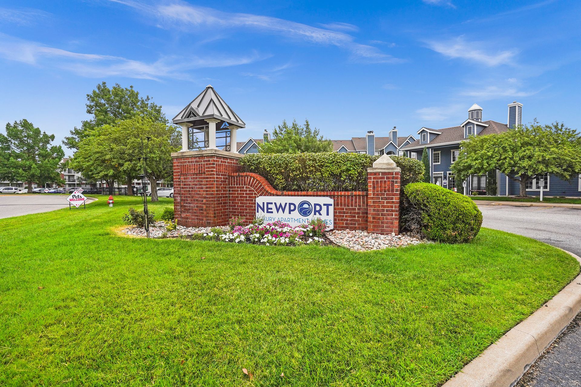 on the levee apartments for rent sign in front of yard