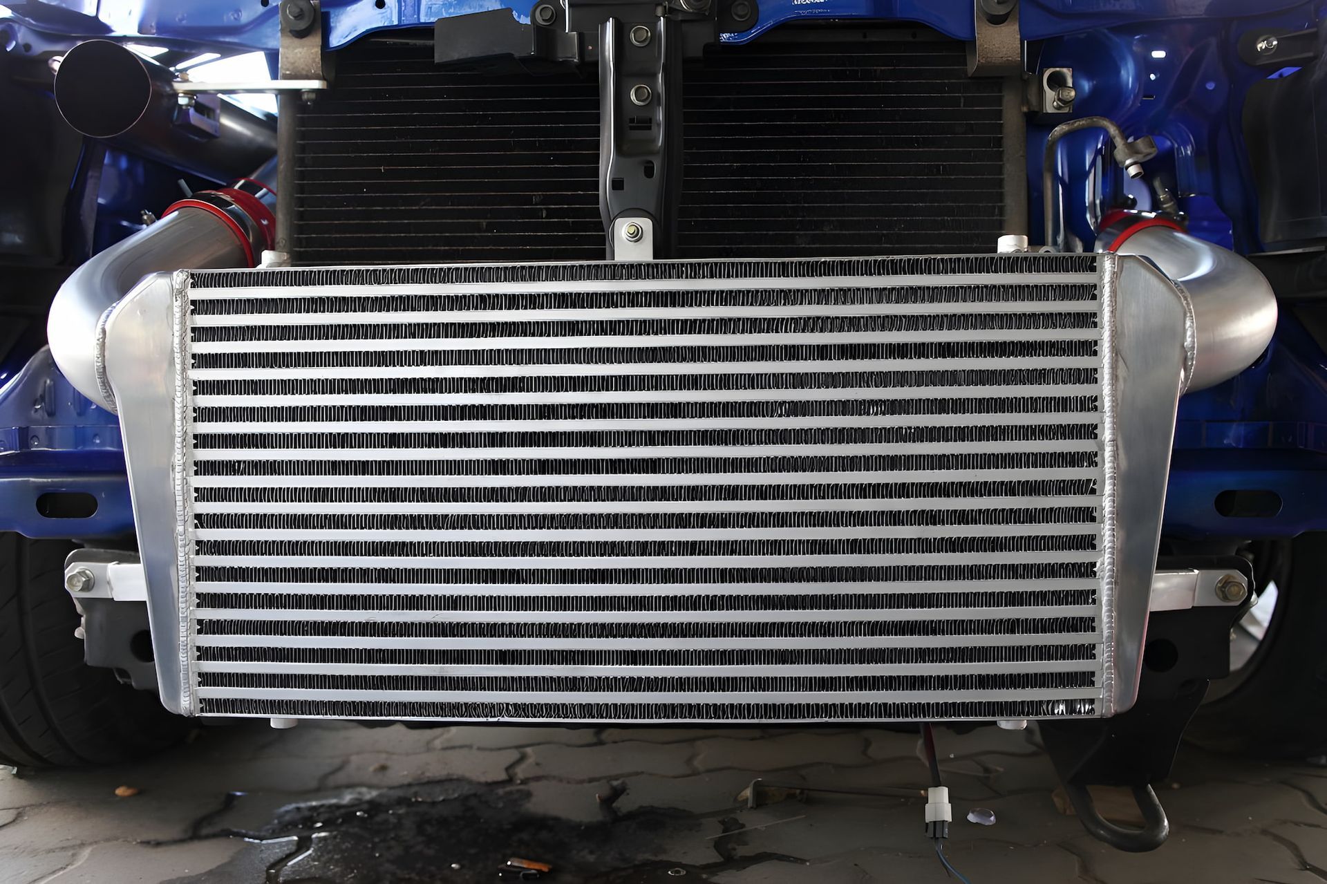 A Blue Car with A Radiator on The Front of It — Steve Purse Automotive In Woollamia, NSW
