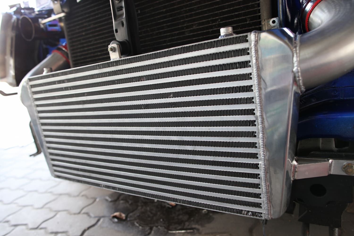 A Close up Of a Radiator on The Front of A Car — Steve Purse Automotive In Huskisson, NSW
