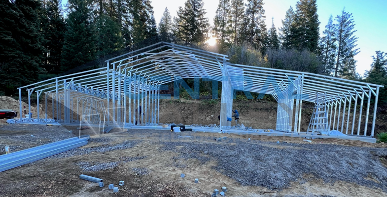 A&A Engineering - Red Barn with two right lean-tos and two left lean-tos with internal wall frame-outs image 1