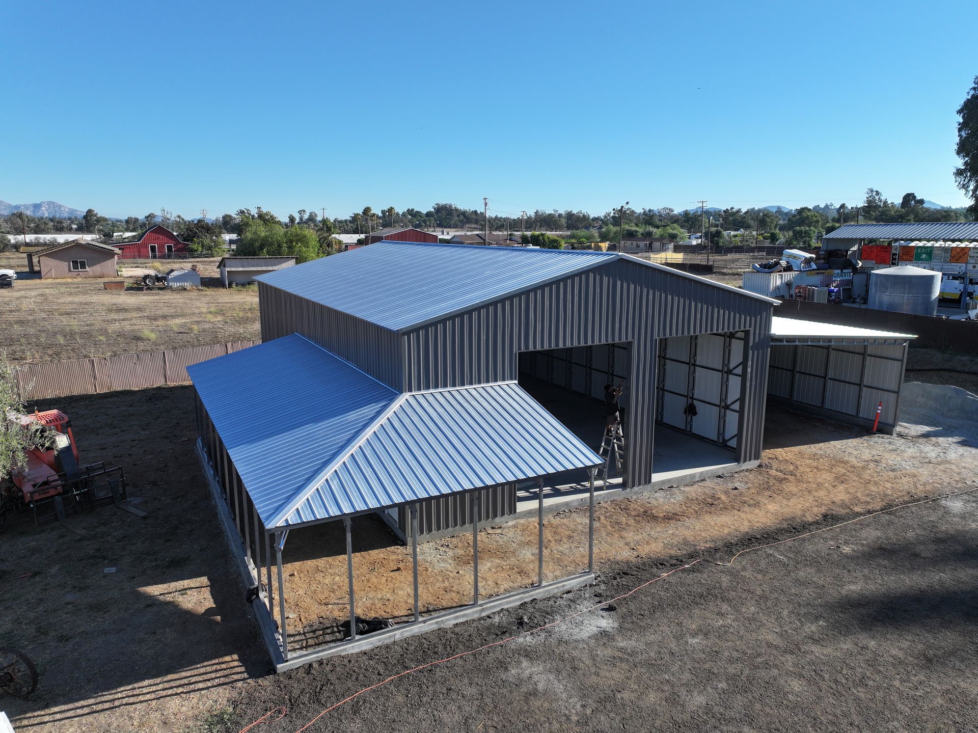 A&A Engineering - Large Building with wrap around lean-to image 1