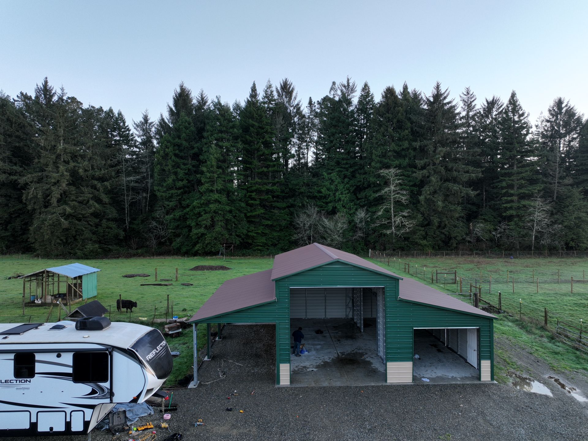 A&A Engineering - Red Barn with partially enclosed lean-to and multiple foundations image 1