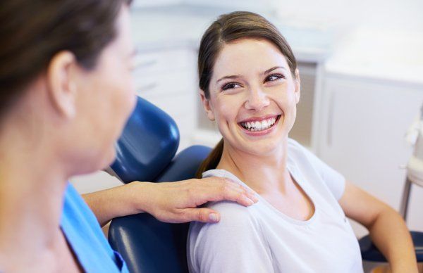 woman at dentist smiling
