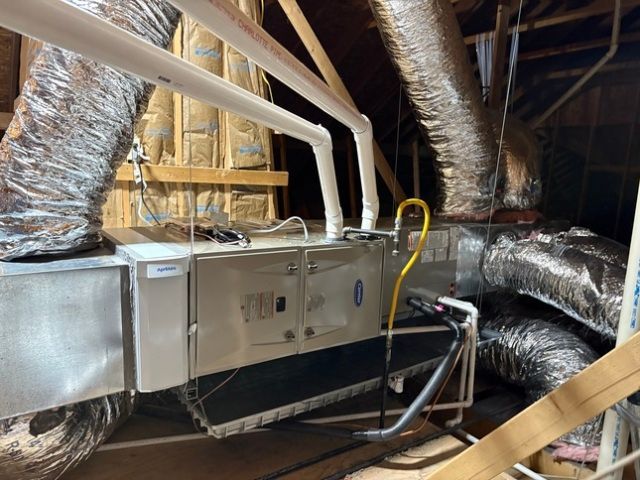 A panasonic air conditioner is mounted on the side of a building.