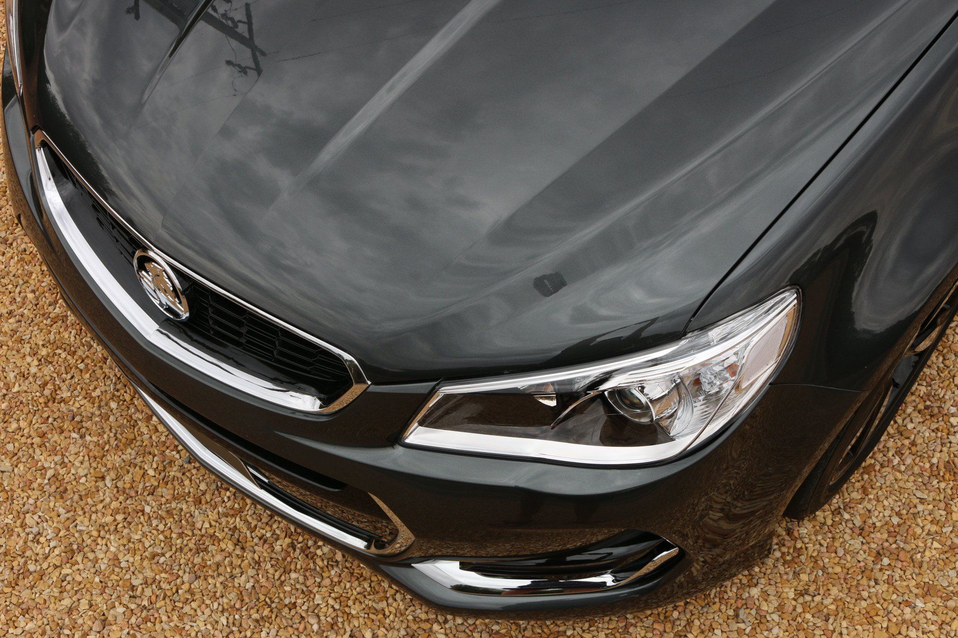A close up of the front of a black car