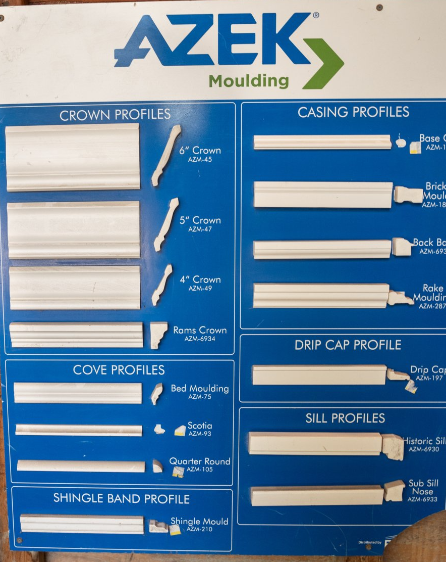 A sign for azek moulding shows different types of molding