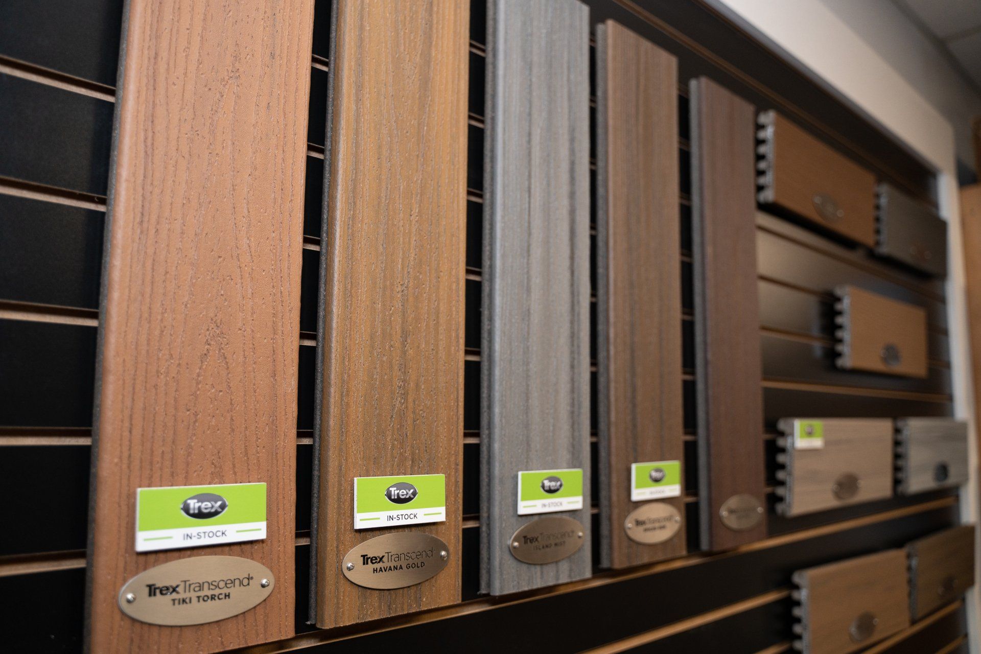 A wall with a lot of different types of wood on it