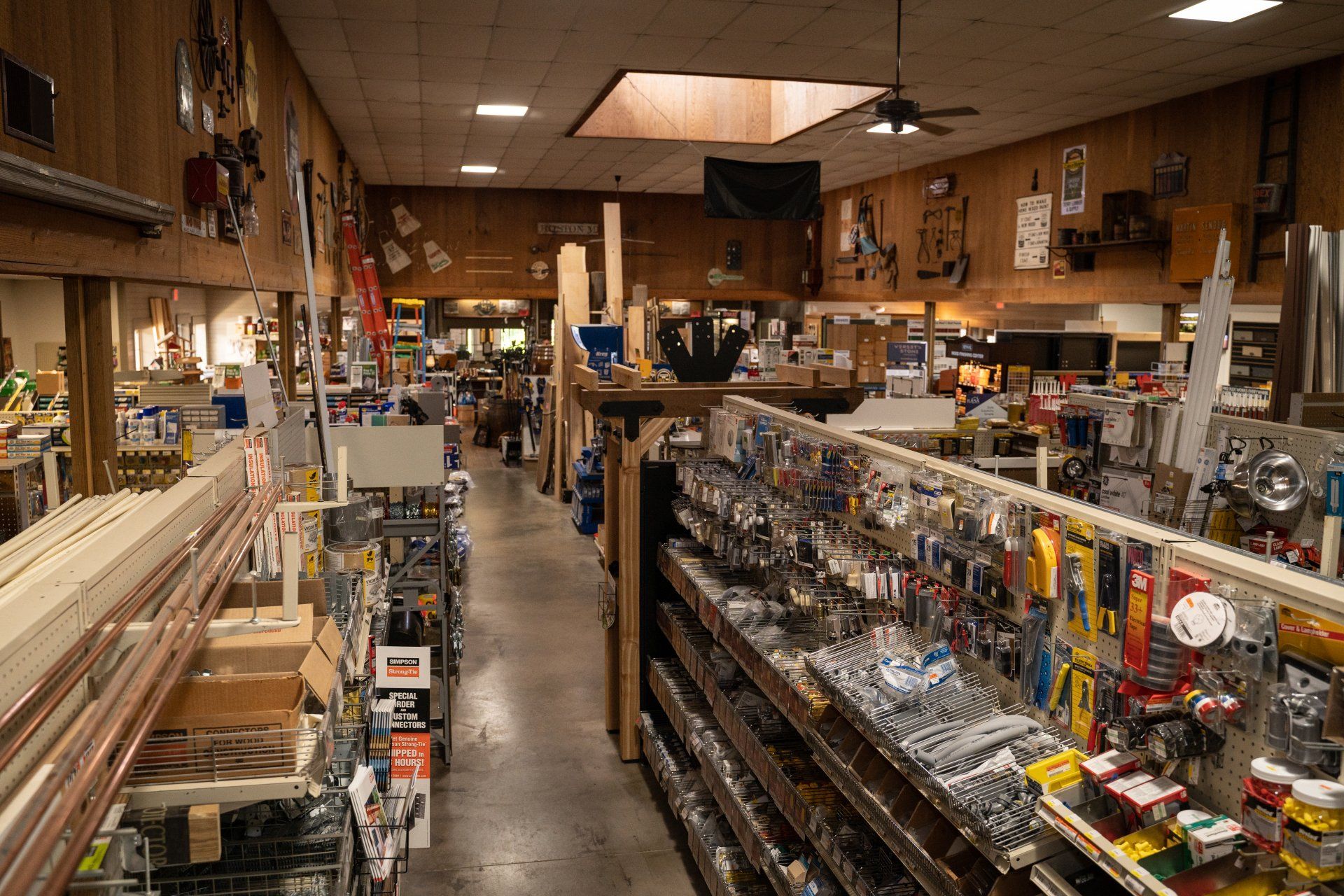The inside of a hardware store filled with lots of supplies.