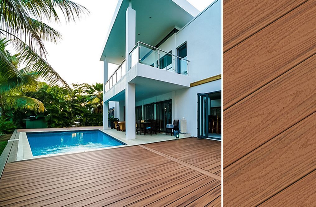 A large house with a swimming pool and a wooden deck