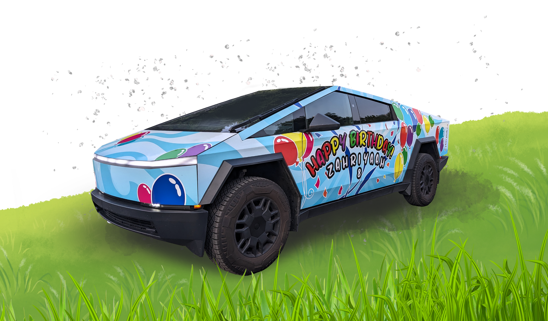 Cybertruck with colorful birthday design on a grassy hill.